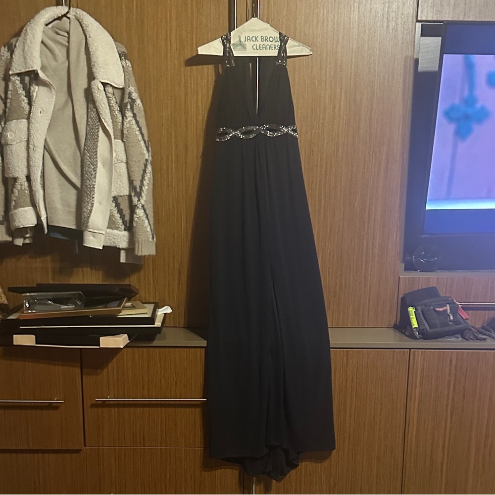 Elegant Black Evening Gown with Embellished Detail